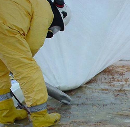 Vacuuming liquids from acid spill