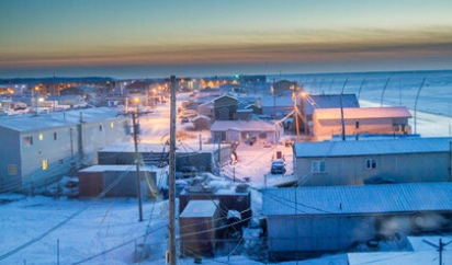Frozen buildings and roadway in Kotzebue.