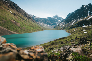 Scenic picture of a valley in Alaska with a lake.